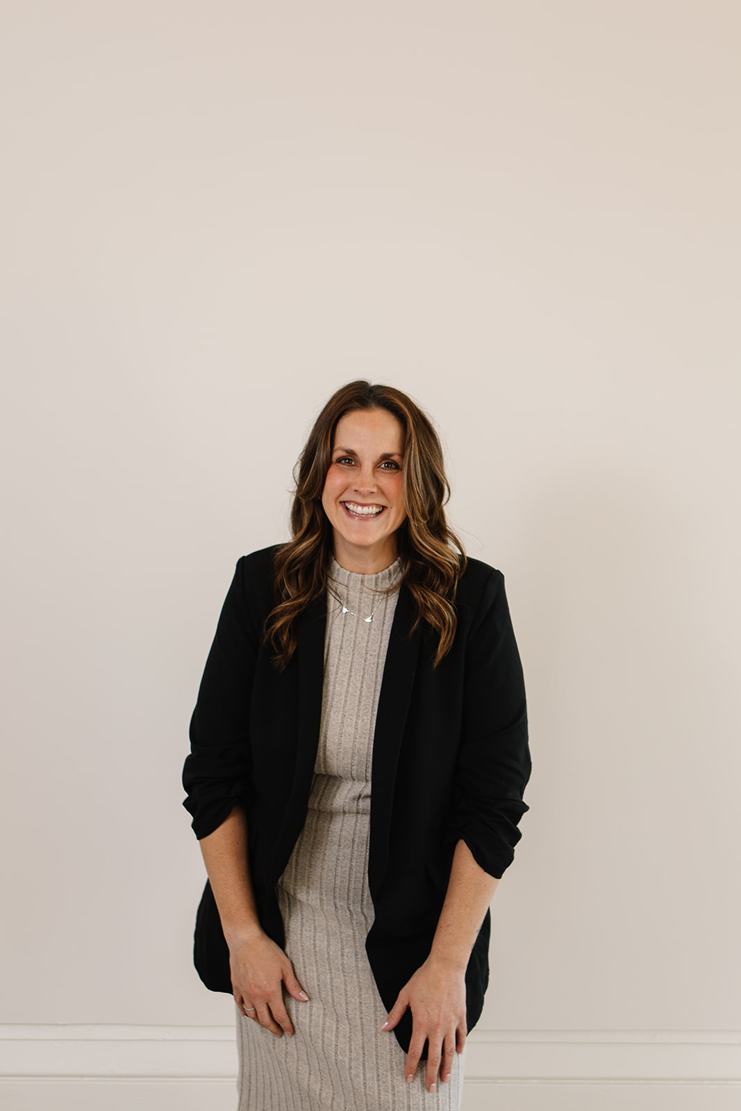 woman and real estate agent laughing genuine